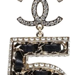 Chanel Crystal CC No 5 Chain Drop Dangle Earrings Black Leather Light Gold Metal -Online Bag Store C E 231117 1 04 1024x1024 33b6d6cf f681 403c a244 98b37ce818bf