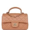 Chanel Mini Rectangular Flap With Top Handle Caramel Lambskin Light Gold Hardware 1 Chanel Mini Rectangular Flap With Top Handle Caramel Lambskin Light Gold Hardware -Online Bag Store C M255 230321 1 01 ffc4535f 258f 4b34 802e 74ee832c5521